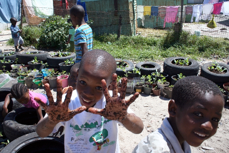 Local kids getting their hands dirty.